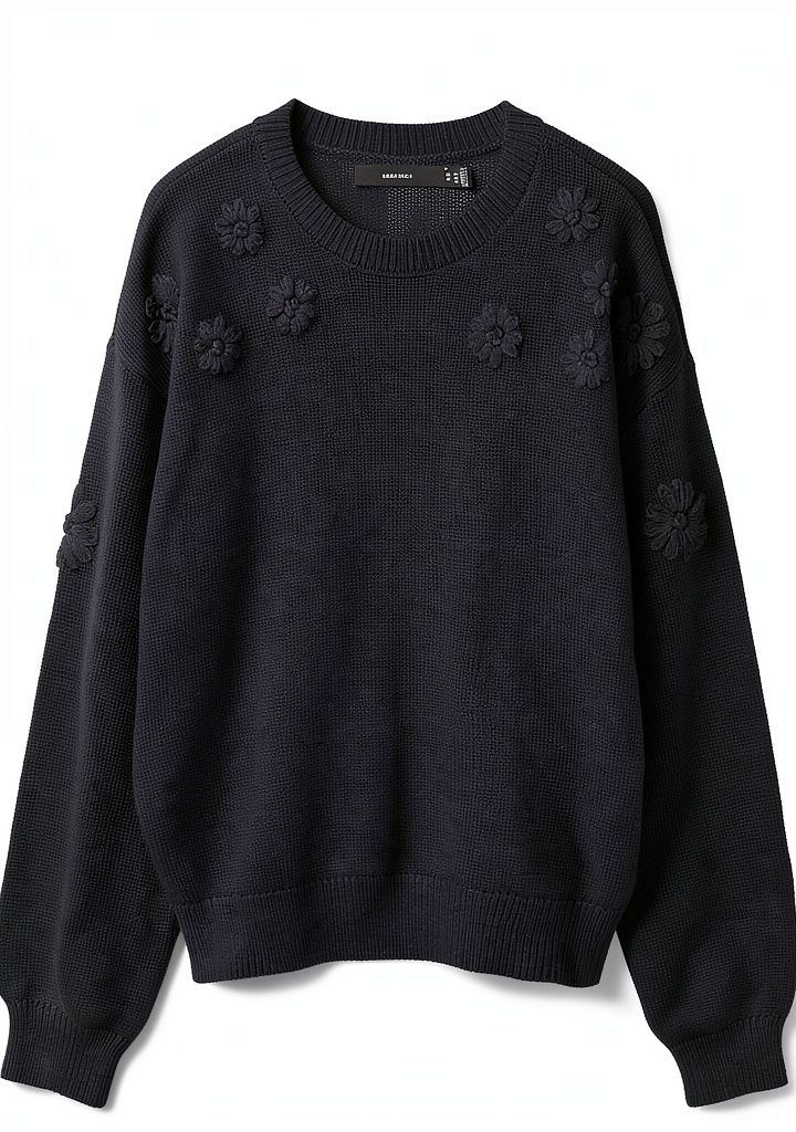 'Maglione Vero Moda indossato in un ambiente casual'